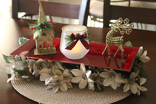Red Christmas floral tray centerpiece  with candle display, church ornament, and reindeer ornament